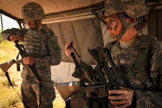 Illustration for article titled Army Memo Says This Woman Is Too Pretty to Take Seriously as a Soldier